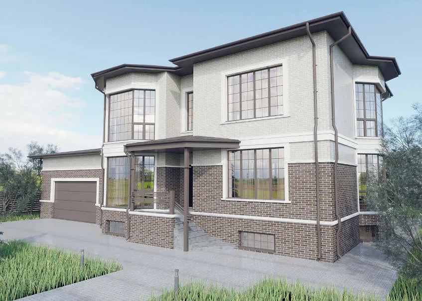 Hiša iz sivih in rjavih zidakov.