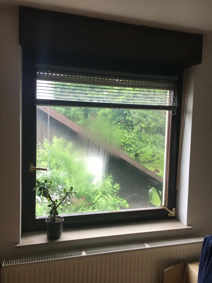 Condensation on a window indicating potential humidity issues in the home environment.